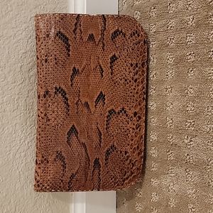 Python clutch, cognac color